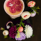 Elegant Rose Candle with Floral Arrangement